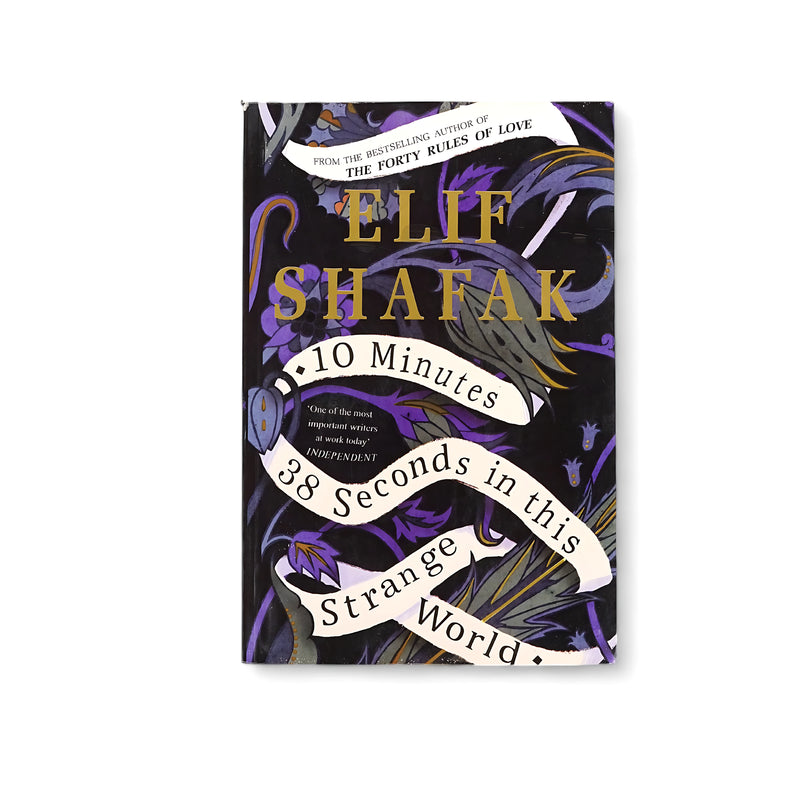 Cover of 10 Minutes 38 Seconds in This Strange World by Elif Shafak, featuring intricate floral designs in purple and black, with a ribbon running across symbolizing the passage of time.






