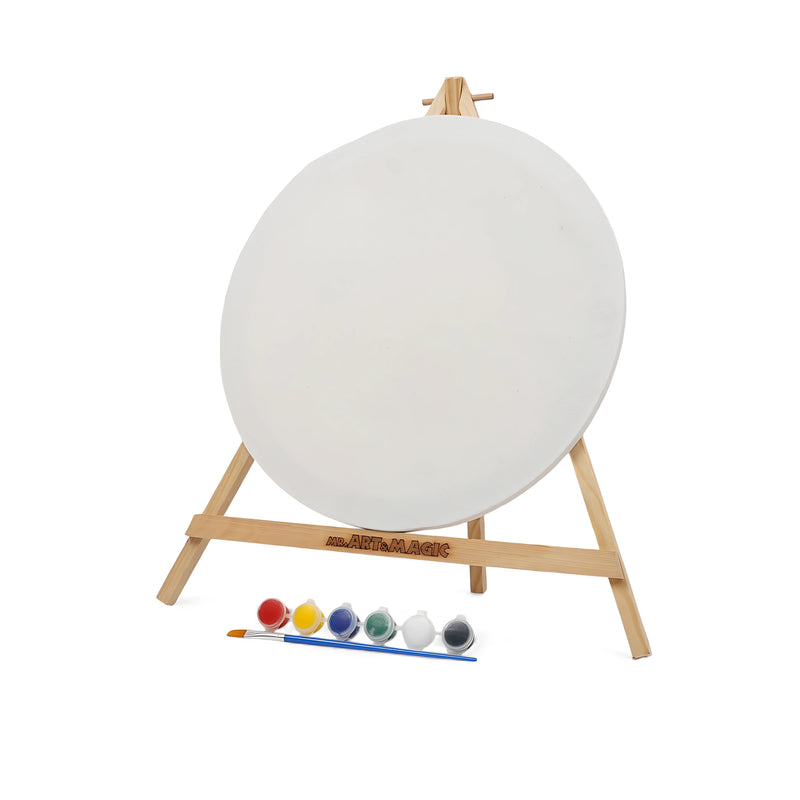Art & Magic Round Canvas Painting Set with round canvas, wooden easel, six paint colors, and a paintbrush for creative projects.

