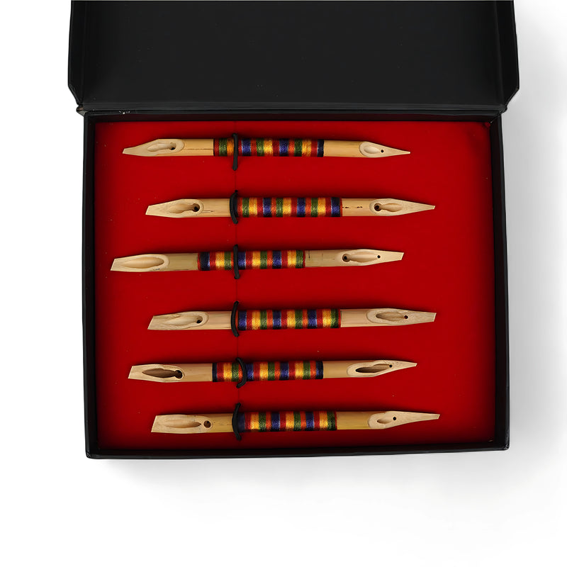 Handmade Bamboo Qalam Calligraphy Set in a large black box with bamboo pens and premium inks, ideal for calligraphy enthusiasts and beginners.

