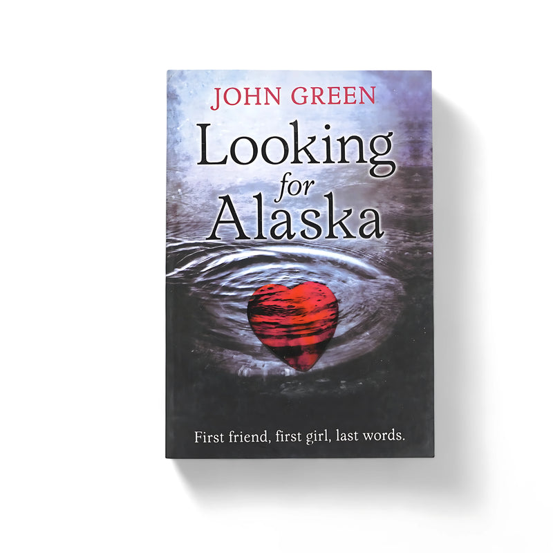 Cover of Looking for Alaska by John Green, featuring a ripple of water with a bright red heart, symbolizing love and emotional depth, against a tranquil backdrop.

