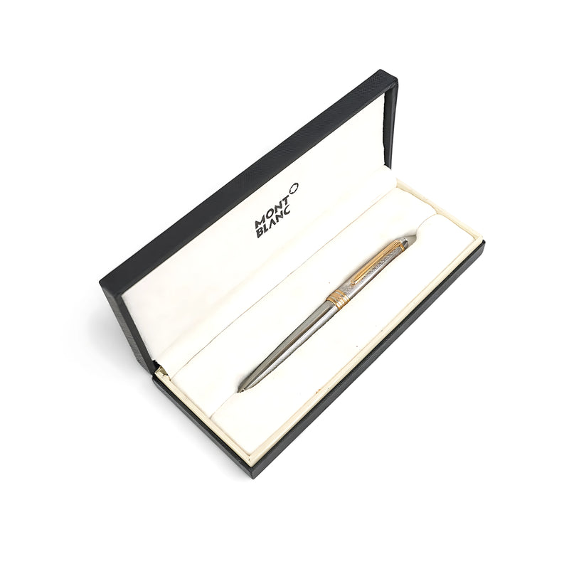 Montblanc Ballpoint Pen with a metal finish and gold accents, presented in a black and white luxury gift box.

