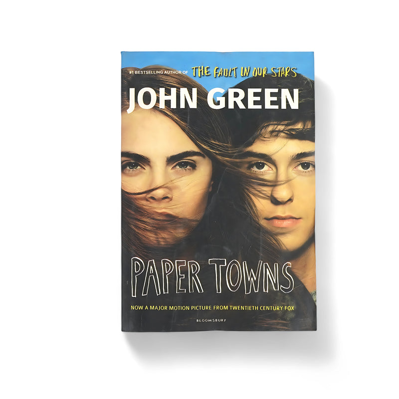 Cover of Paper Towns by John Green, featuring characters from the movie adaptation, capturing the intrigue and emotional depth of the novel.

