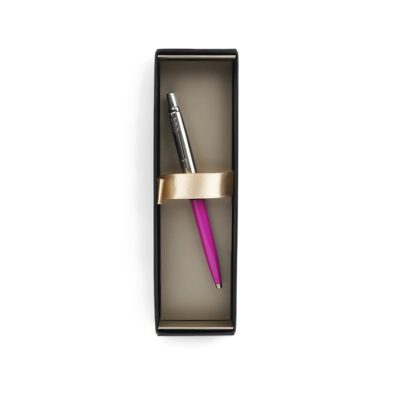 Parker Jotter Ballpoint Pen in pink with chrome accents, displayed in a black gift box with gold detailing, perfect for gifting and everyday use.

