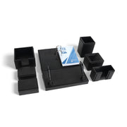 Premium black office desk organizer set with multiple compartments, pen holders, and a calendar stand, designed to keep desks neat and organized.

