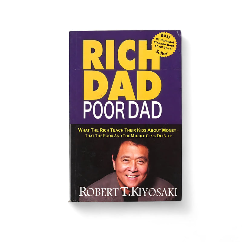 Cover of Rich Dad Poor Dad by Robert Kiyosaki, featuring the author’s portrait and bold typography emphasizing personal finance lessons for achieving financial independence.






