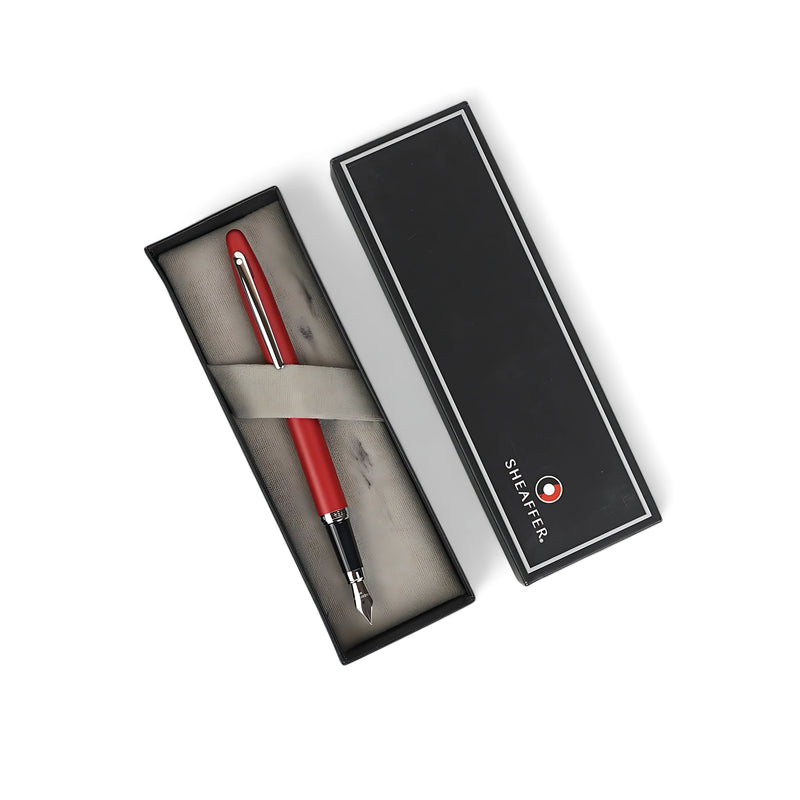 Sheaffer 100 Fountain Pen in red with chrome accents, featuring a stainless steel nib and presented in a black gift box, perfect for gifting and professional use.

