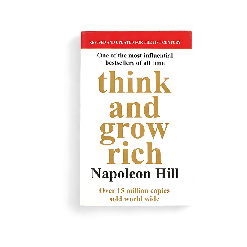 Cover of Think and Grow Rich by Napoleon Hill, featuring minimalist gold typography, symbolizing wealth and success, on a clean white background.

