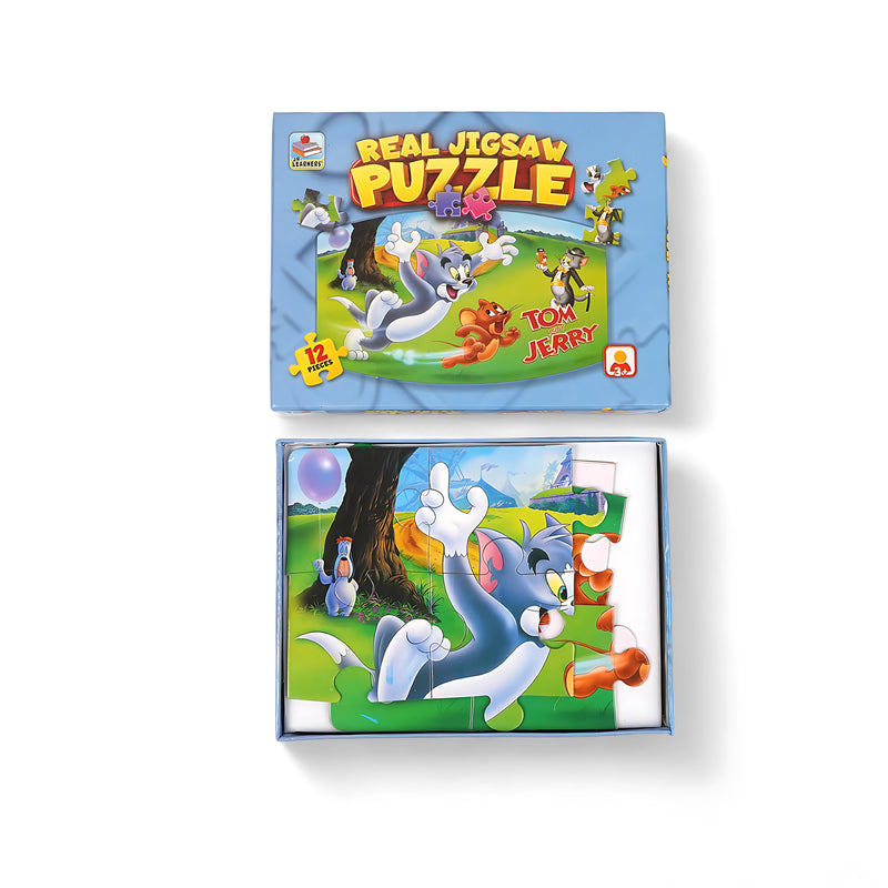 Tom and Jerry 12-piece jigsaw puzzle with vibrant outdoor scenes, packaged in a bright blue box for children aged 3+.

