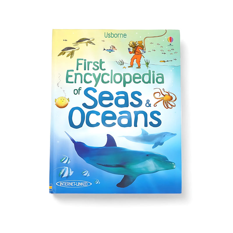 Cover of the Usborne First Encyclopedia of Seas and Oceans, featuring dolphins, turtles, a diver, and various sea creatures in vibrant colors.

