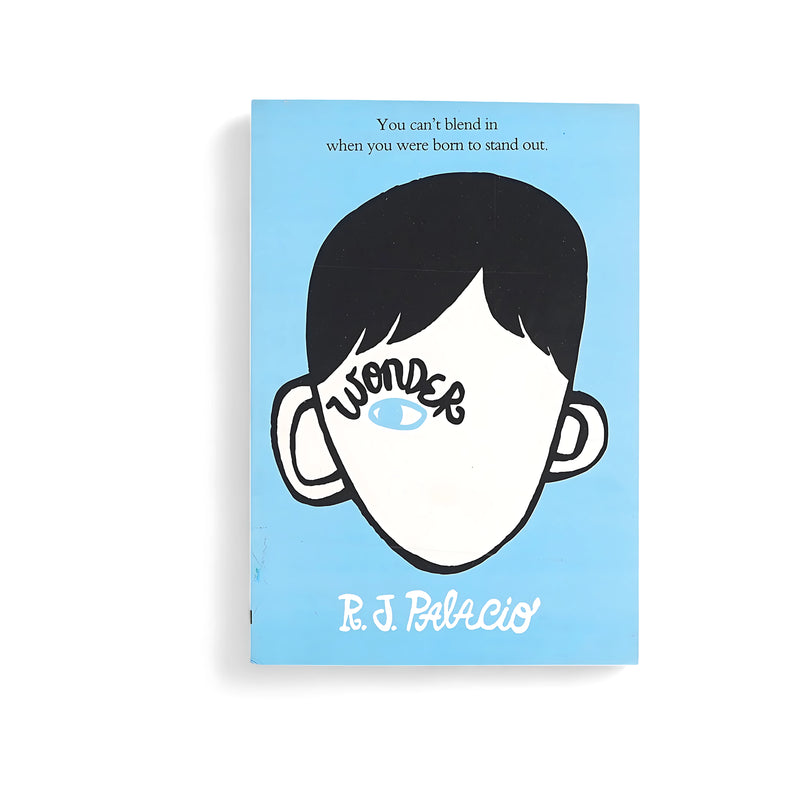 Cover of Wonder by R.J. Palacio, featuring a simple illustration of Auggie’s face with a light blue background, symbolizing kindness and individuality.

