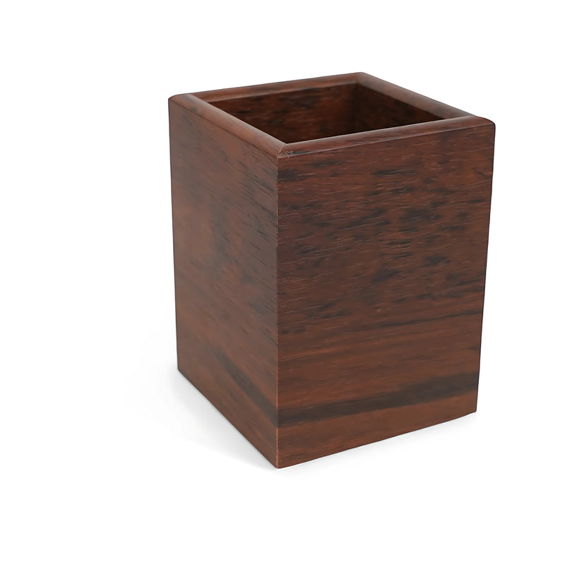 Wooden pen holder with a polished dark wood finish, ideal for organizing pens and stationery on desks.

