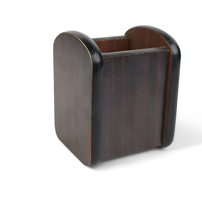 Wooden pen holder with rounded edges and black accents, ideal for organizing pens, stationery, or accessories.

